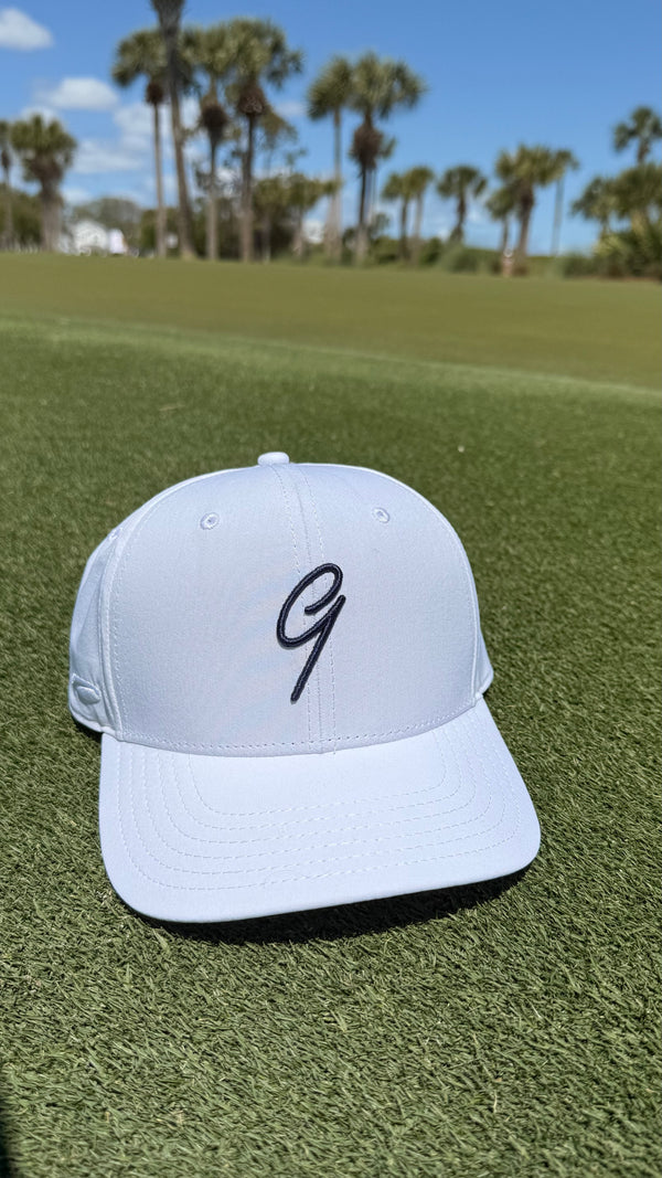 e9 golf Logo Mid Crown Performance Tech Hat by Pukka